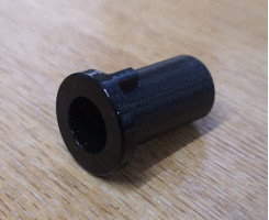 Handbrake lever button spring sleeve