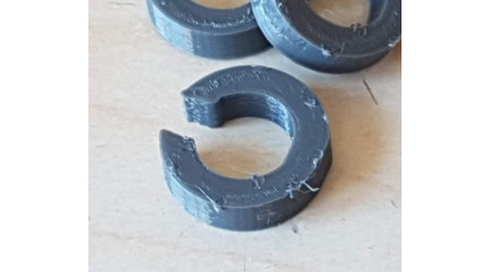 Steering adjuster clip